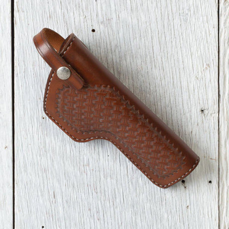 Practice traditional leather crafting techniques with leather projects like this gun holster.